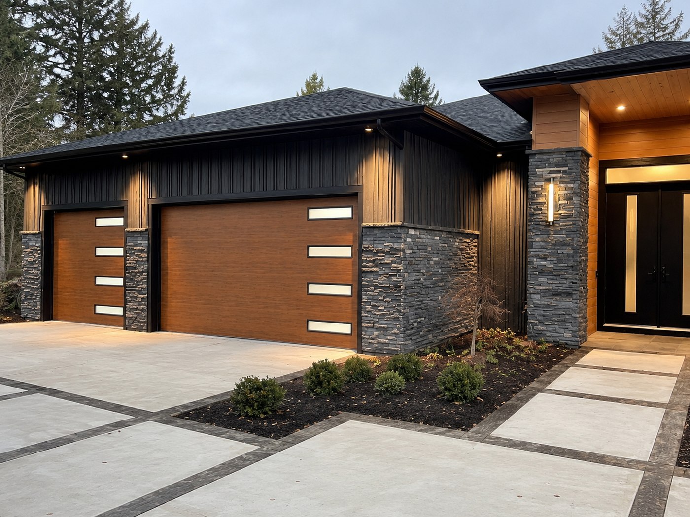 Modern flush-panel steel garage door on a contemporary home