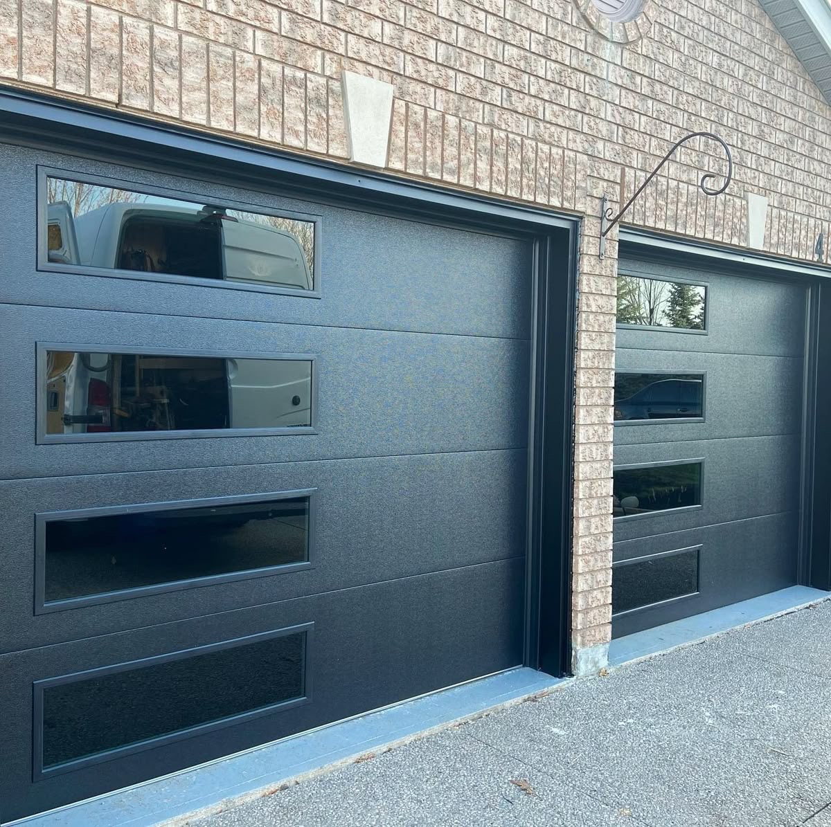 Dark charcoal steel carriage house garage door Burlingame