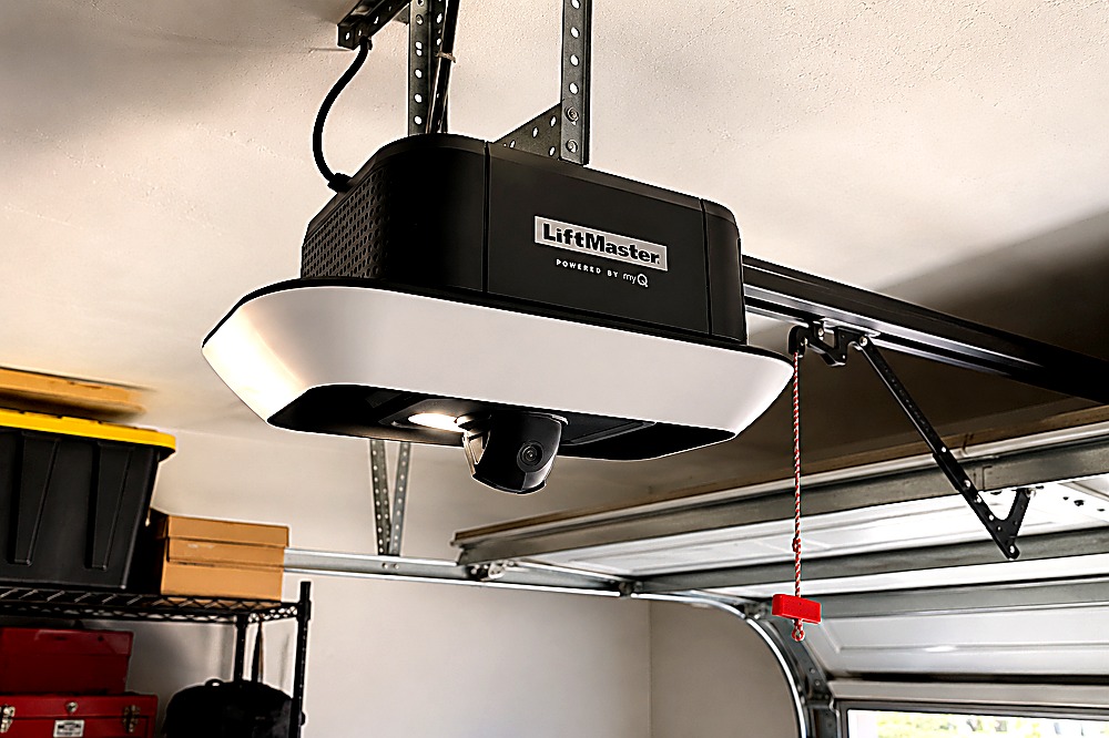 A ceiling-mounted LiftMaster belt-drive garage door opener with manual release cord in a Bay Area garage